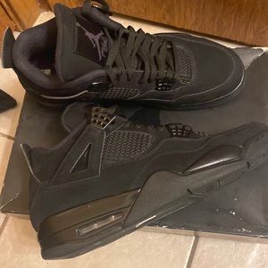 Black Cat Jordan 4s